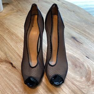 Christian Louboutin high heels.